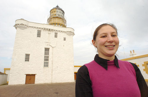 Virginia Mayes-Wright outside Kinnaird Head lighthouse, home of the Museum of Scottish Lighthouses