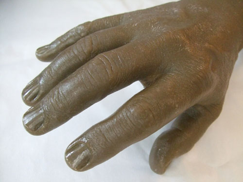 Resin cast of right hand used in the manufacturing of cosmetic gloves
