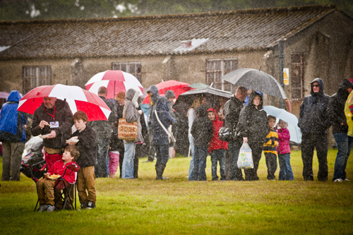 Crowd sheltering from the rain at the Airshow at National Museum of Flight, East Fortune on Sat 28 July 2012