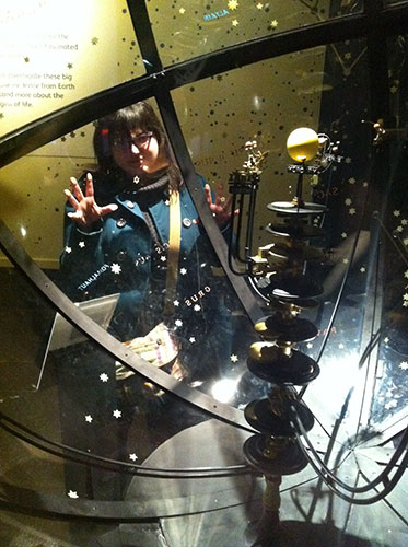 Chella looking through the orrery