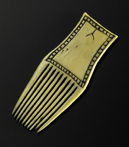 Woman’s comb of walrus ivory, Inuit, collected by John Rae, likely 1848 or 1851. 