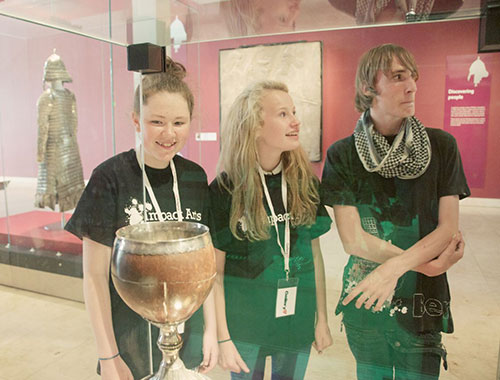 Participants with the coconut cup in the Discoveries gallery