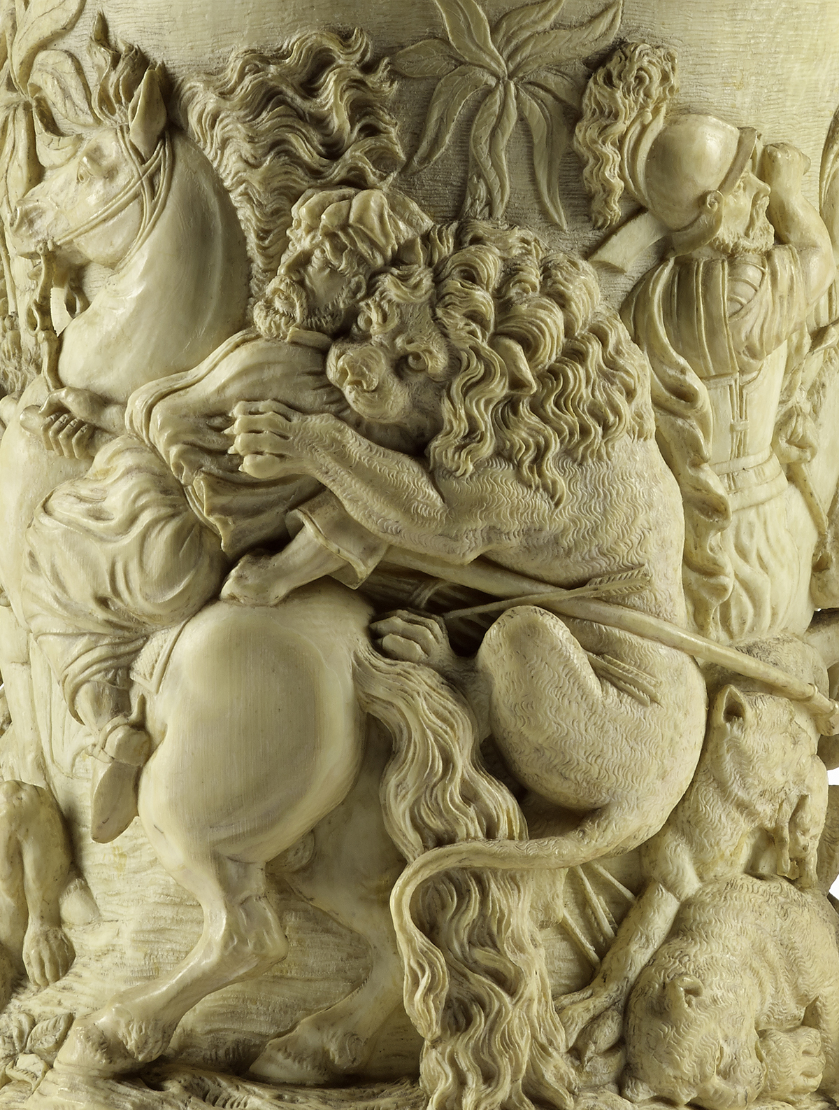 A.1083 – Detail of an Ivory tankard carved with 'The Lion Hunt', after Rubens, in high relief: German, mid-19th century.