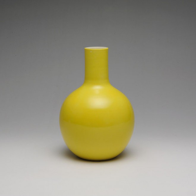 Globular yellow vase by Seifu Yohei III