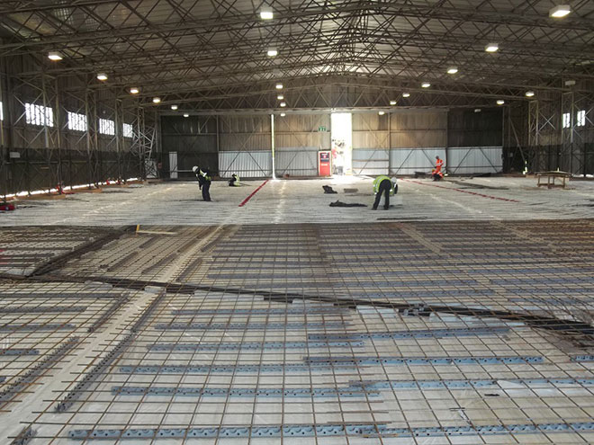 Laying heating pipes in hangar 2