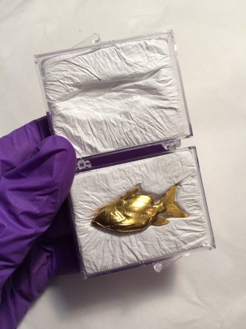 Unpacking the gold catfish pendant at the Metropolitan Museum of Art