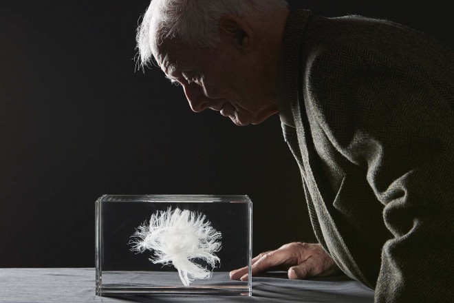 John examines the laser-etched crystal model of his white matter.