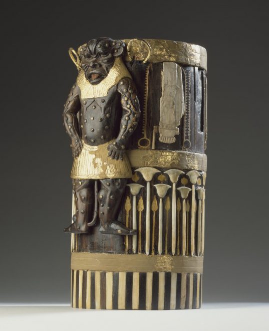 Box of cedar wood with ebony veneers and ivory inlays and gilding depicting the god Bes and bearing the cartouches of Amenhotep II: Ancient Egyptian, New Kingdom, 18th Dynasty, c.1550-1295 BC. 