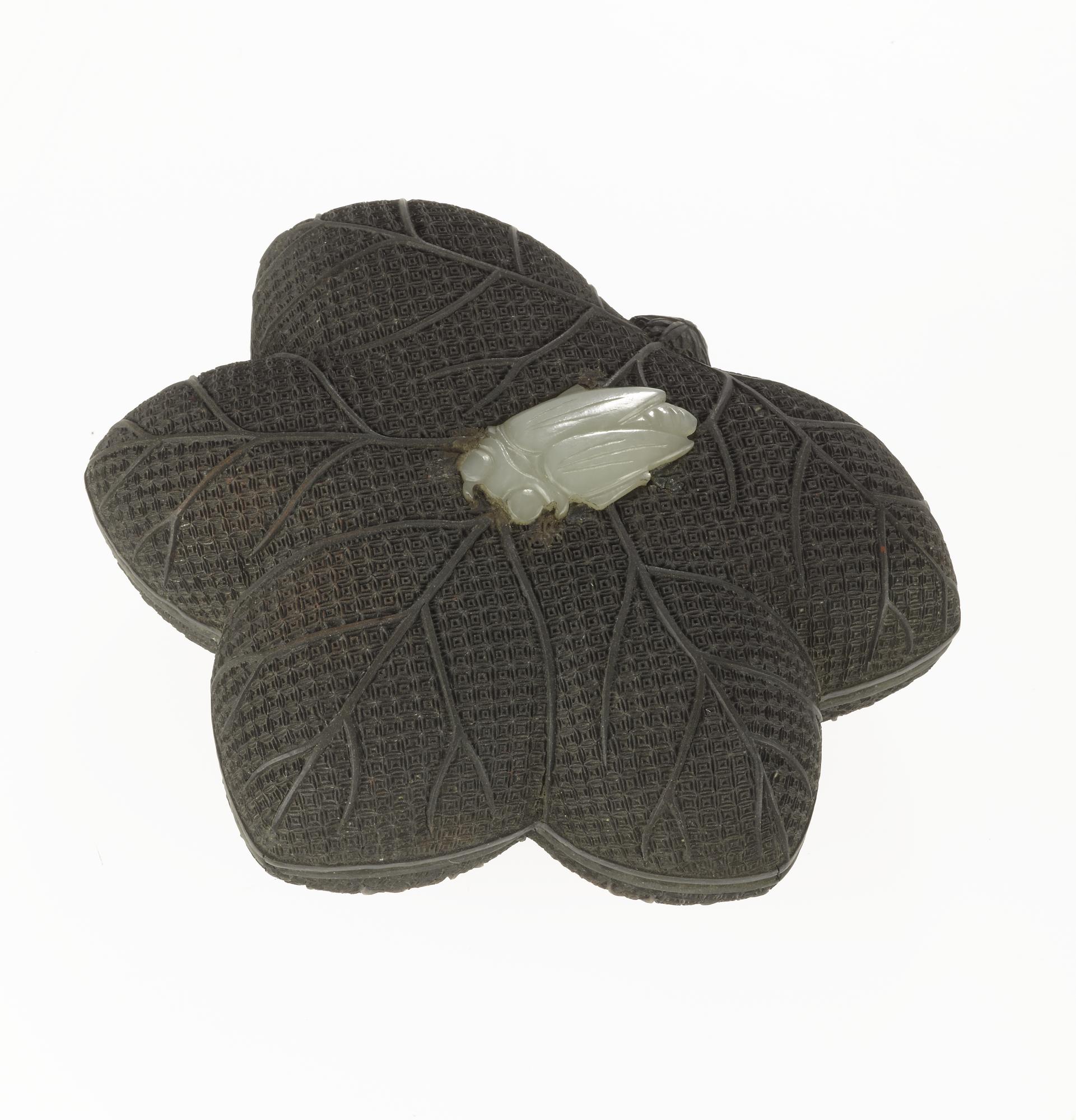 Box and cover of olive green lacquer, pentafoliate maple leaf form, with a white jade cicada on the cover, and a black lacquer interior painted with flower and fruit sprays: China, Qing dynasty, Qianlong reign, 1736 - 1795 (A.1930.500).