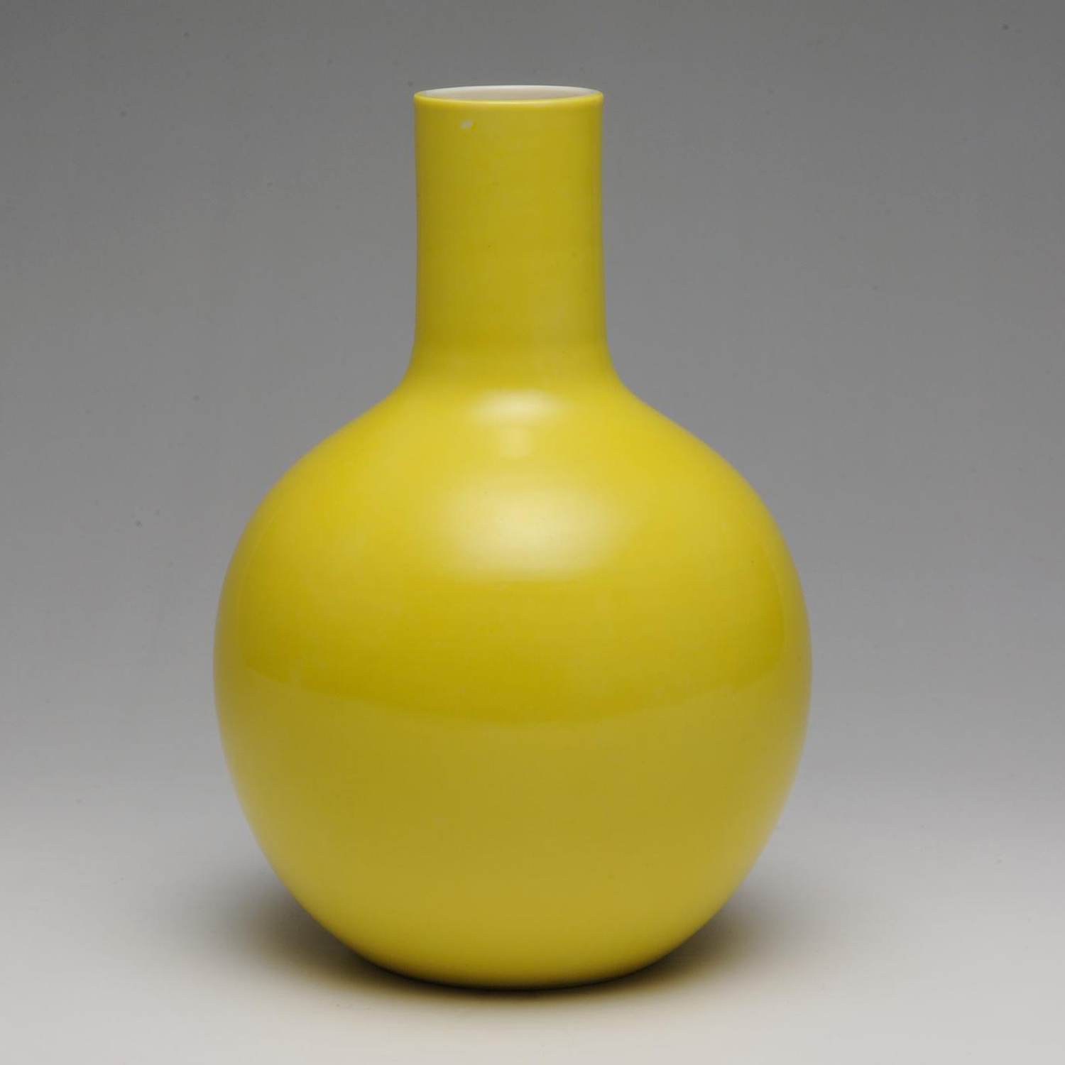 Globular vase of porcelain with glaze emulating chicken-fat yellow of the Ming dynasty: Japan, by Seifu Yohei III, 1890s