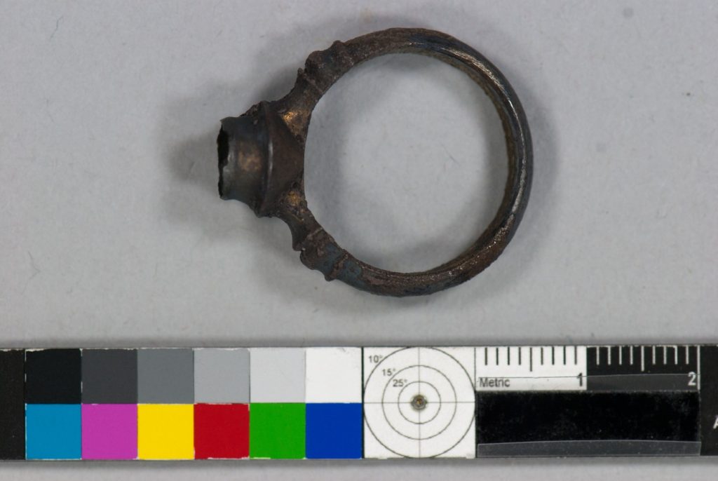 Fig.1 the ring had a thick crust of corrosion over the surface which would have developed during burial.