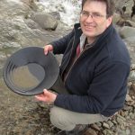 Neil Clark panning for gold in Wanlockhead. He is a curator at The Hunterian Museum, University of Glasgow.