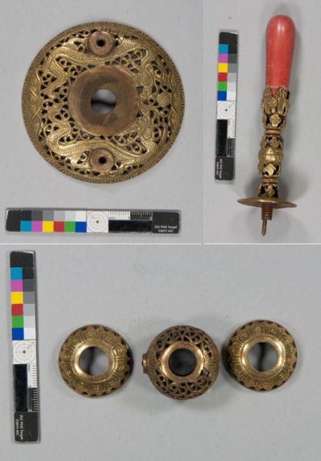 The gilt copper-alloy elements of the base of the plume taken apart for conservation.