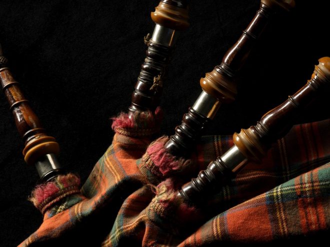 Bagpipes with Royal Stewart tartan cover