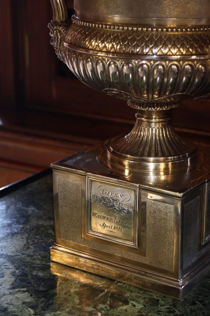 Image of the base of the urn Byron gave to Walter Scott, inscribed Given by Lord Byron to Walter Scott April 1815". 