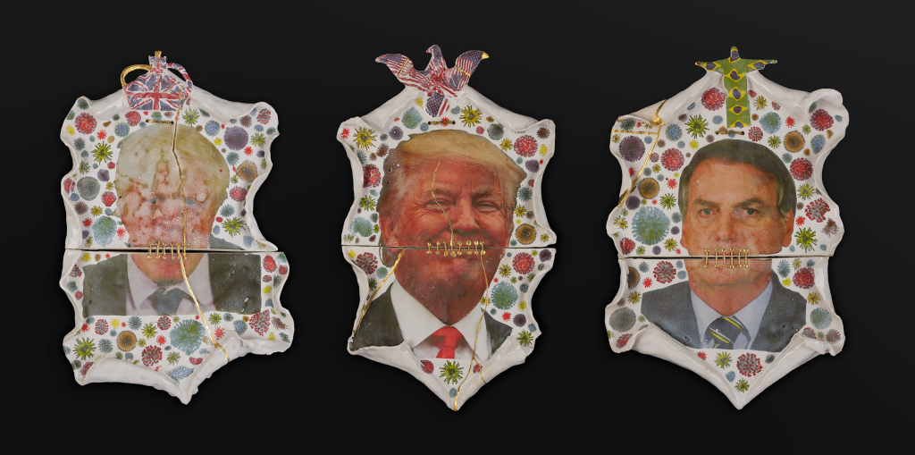 Ceramic plate with world leaders (Boris, Bolsonaro and Trump) on them, that are broken and have been stapled back together.