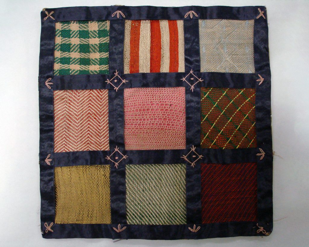 A three by three squares sampler showing different techniques and fabrics.