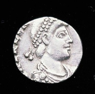 Silver coin with a classic Roman emperor bust, the youthful emperor wearing a beaded headband.