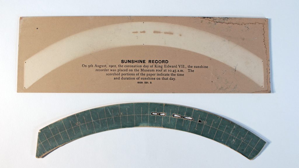 Some card with a groove burned out of it showing the sunshine record for the day of King George VII's coronation on 9 August 1902.