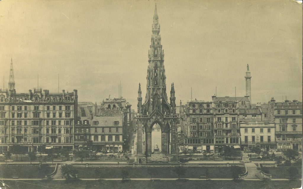Vintage sepia-toned wide view of Princes Street, Edinburgh, centred on the rocket-shaped Scott Monument. The Jenners building we all know isn't yet there among the New Town skyline.