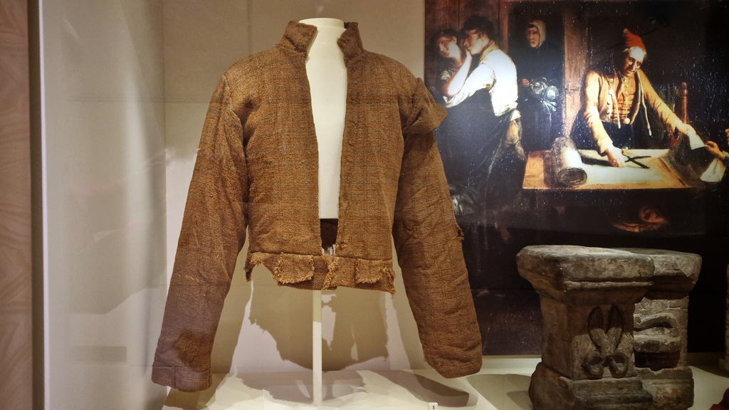 The doublet in the display case in the museum.