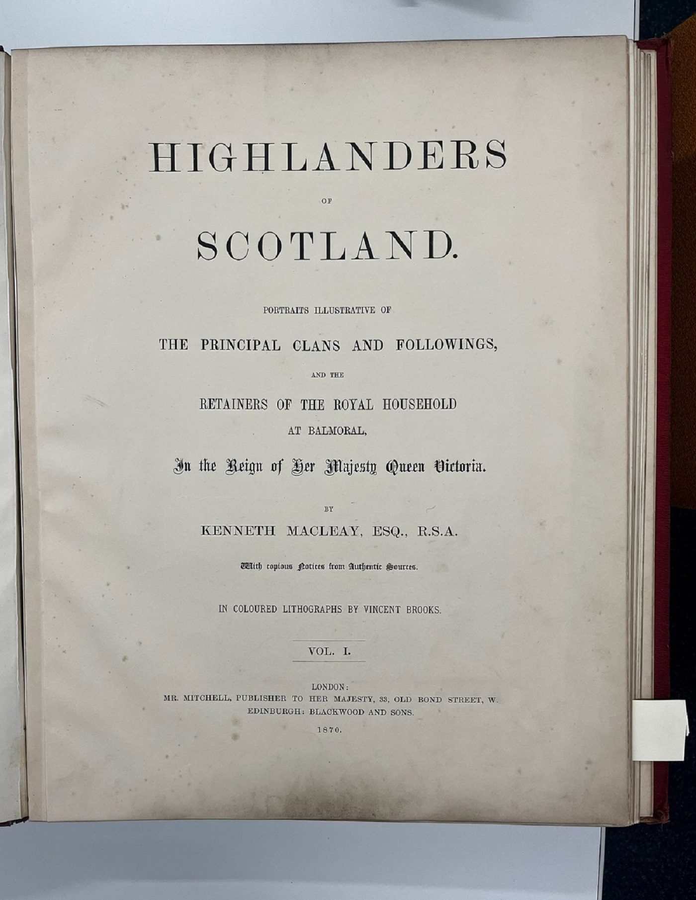 An open page in an old book with several different fonts used. The main text reads, 'Highlanders of Scotland: Portraits Illustrative of the Principal Clans and Followings.'