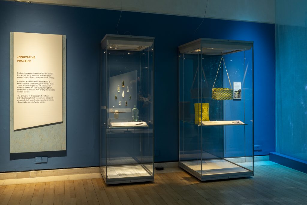 Cases of objects in the Rising Tide exhibition. 