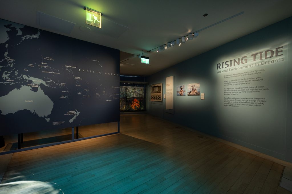 The entrance to the 'Rising Tide' exhibition' showing a map of Oceania. 